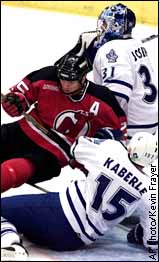 Tomas Kaberle, Jason Arnott and Curtis Joseph